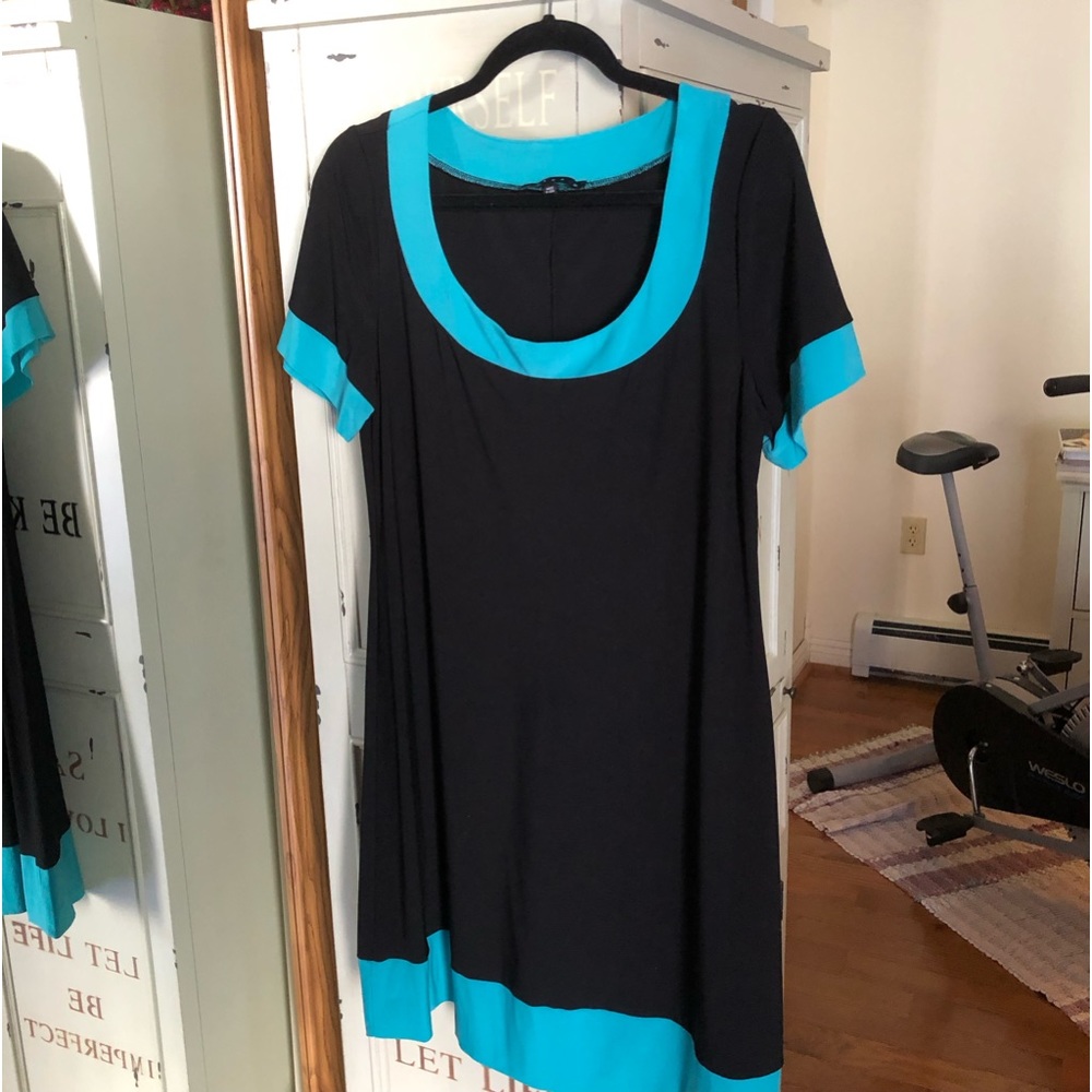 Tiana B - just above the knee, slightly a-line dress. Size L